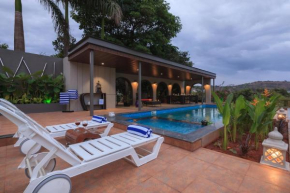 StayVista's The Cincin with Elegant Rooms, Snooker Table, Pool, Scenic View, and Jacuzzi
